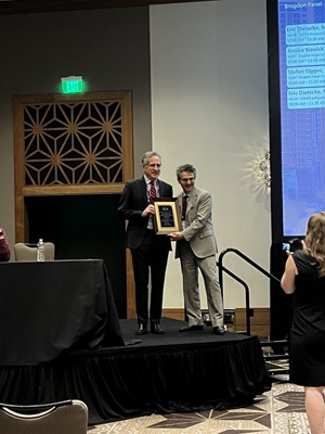 Dr. David Mankoff received the 2023 RRA Innovation and Leadership Award. Dr. Mankoff was announced by Chairman Mitchell Schnall and the award was presented by Dr. Reed Omary AUR president.